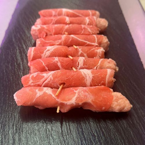 Involtini di carpaccio di suino con carne macinata e parmigiano